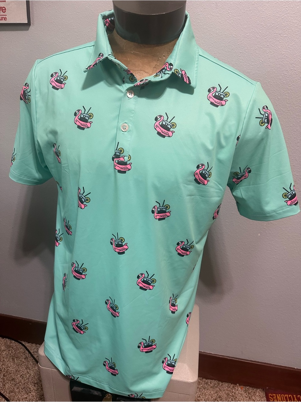 Sunday Swagger Men's Mint Green Polo Shirt with Pink Flamingo Float Print